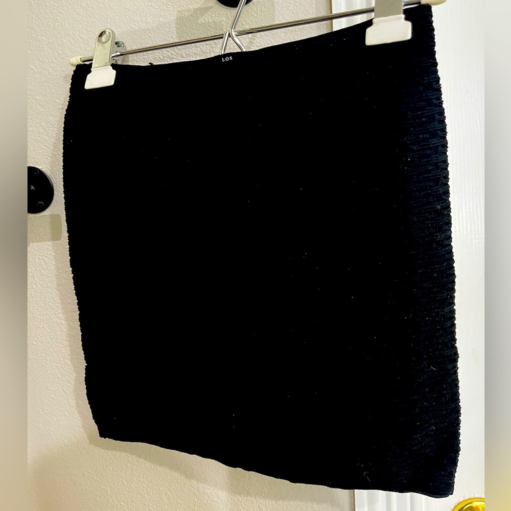 Black XS Guess Jeans miniskirt - very stretchy textured material